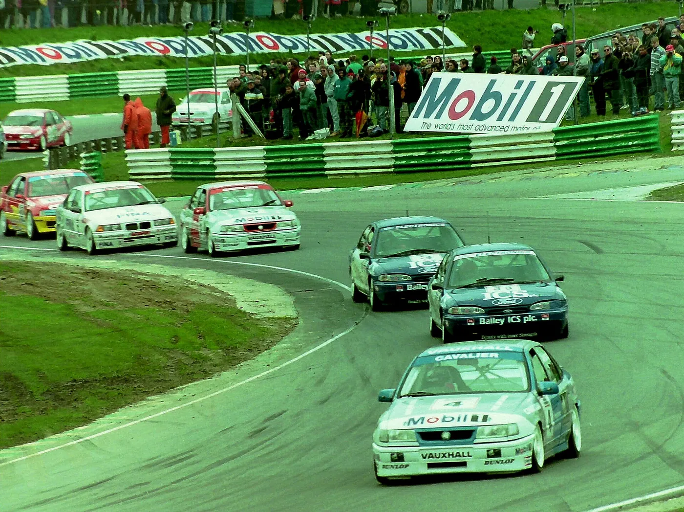 Jeff Allam - Vauxhall Cavalier leads the Mondeos at Mclaren at the BTCC races, Brands Hatch April 17 1994 (32668885666).