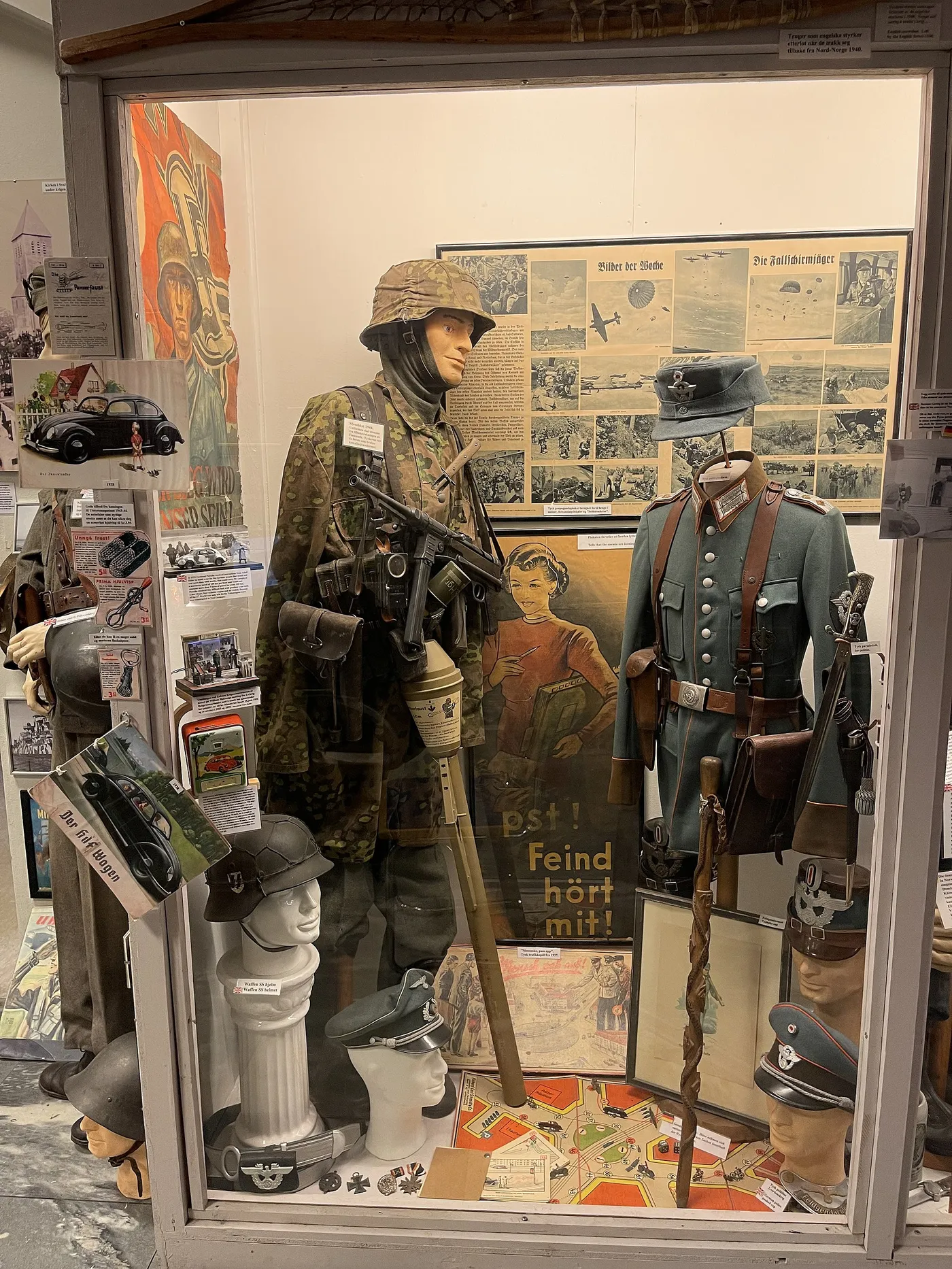 Nazi Germany uniforms etc. Waffen SS camouflage MP40 Panzerfaust Propaganda posters Stahlhelm Visor caps equipment KdF W