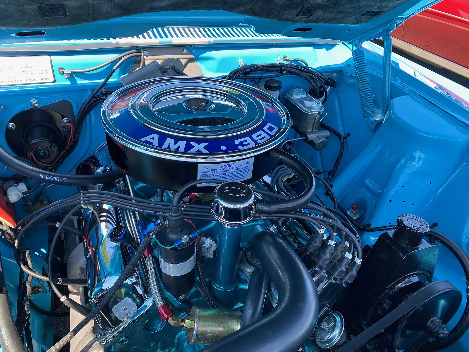 1969 AMX, a two-seat GT sport coupe made by American Motors Corporation (AMC). This muscle car is driven and has over 166,000 miles on the o