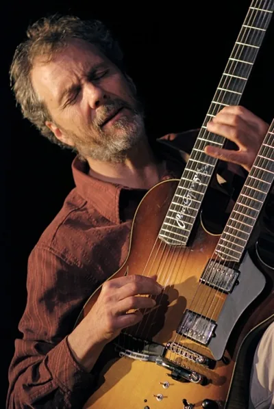Peter Sprague playing twin-neck guitar