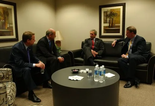 President George W. Bush meets with, from left, William Clay Ford Jr., Chairman & CEO of Ford Motor Company; Dieter Zetsche, President & CEO