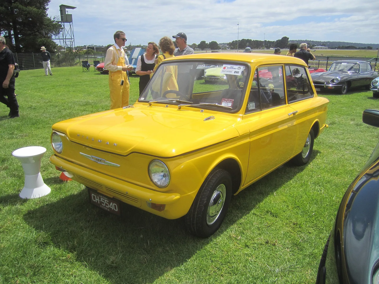 Note the owner is dressed to match his car!!
The compact, rear engine Imp was built from 1963-76 to rival the Mini. It got a rear mounted 87