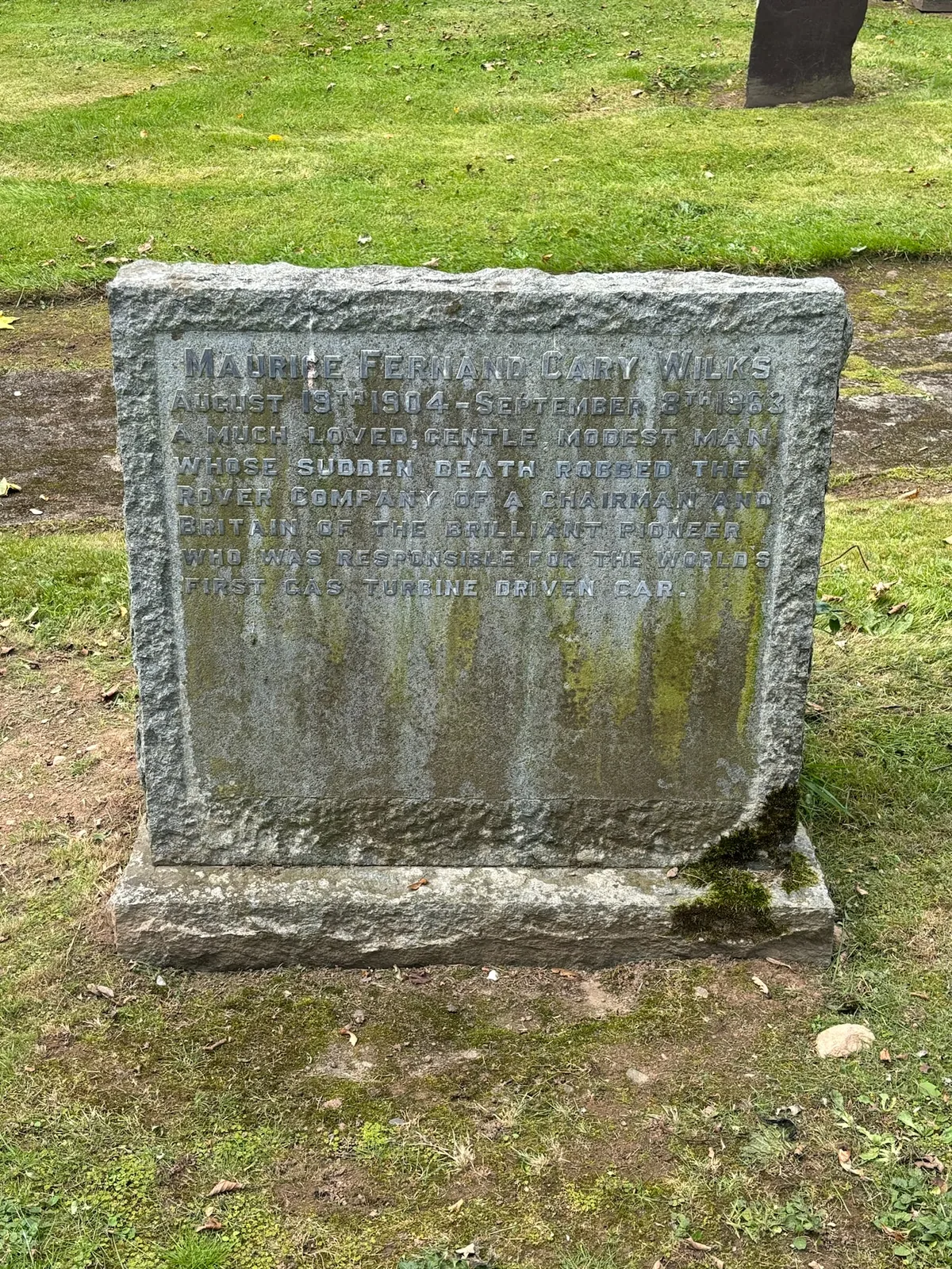 The gravestone of Maurice Wilks, English automotive and aeronautical engineer and founder of the Landrover marque.
The inscription reads:

M