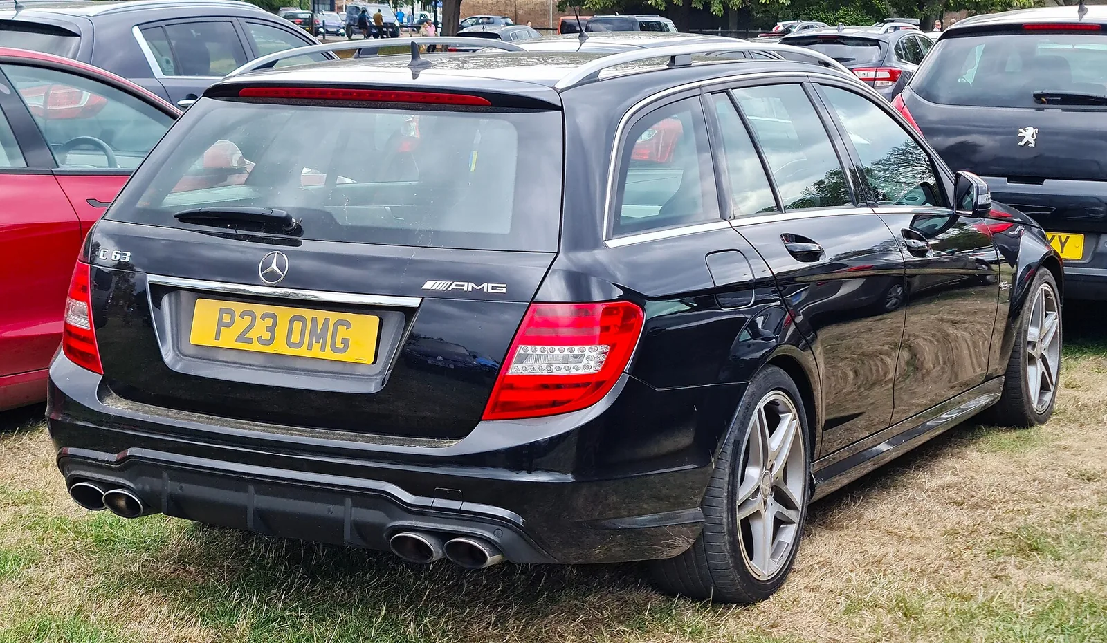 A Mercedes-Benz C63 AMG taken at Hampton Court Concours 2022.