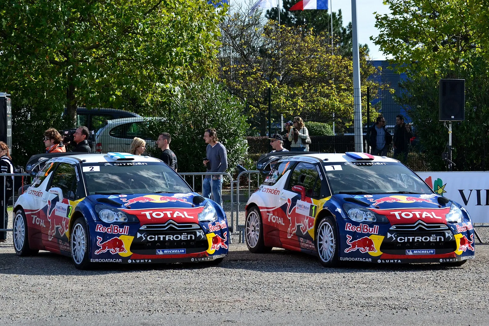 Mikko Hirvonen and Sébastien Loeb's cars at the Colmar Assistance Park during the Rally France-Alsace 2012.