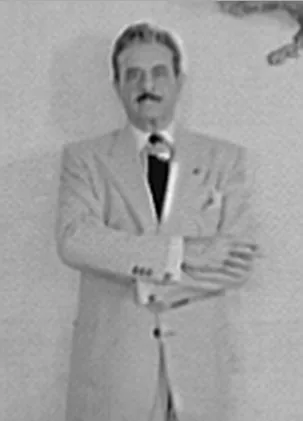 Cropped to show Loewy only. Enhanced with GIMP.
Title: Raymond Loewy Associates, 488 Madison Ave., New York City. Mr. Loewy under eagle